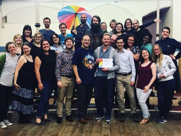 One of our new members receiving their certificate One of our new members receiving their certificate